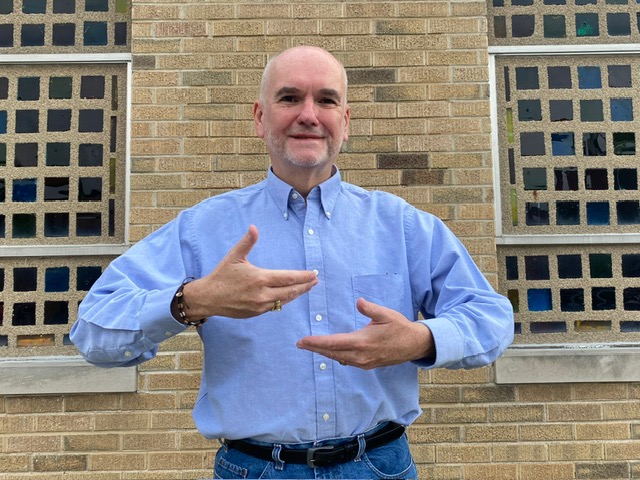 Director signing in American Sign Language for Deaf Catholic Ministry Formation Programs